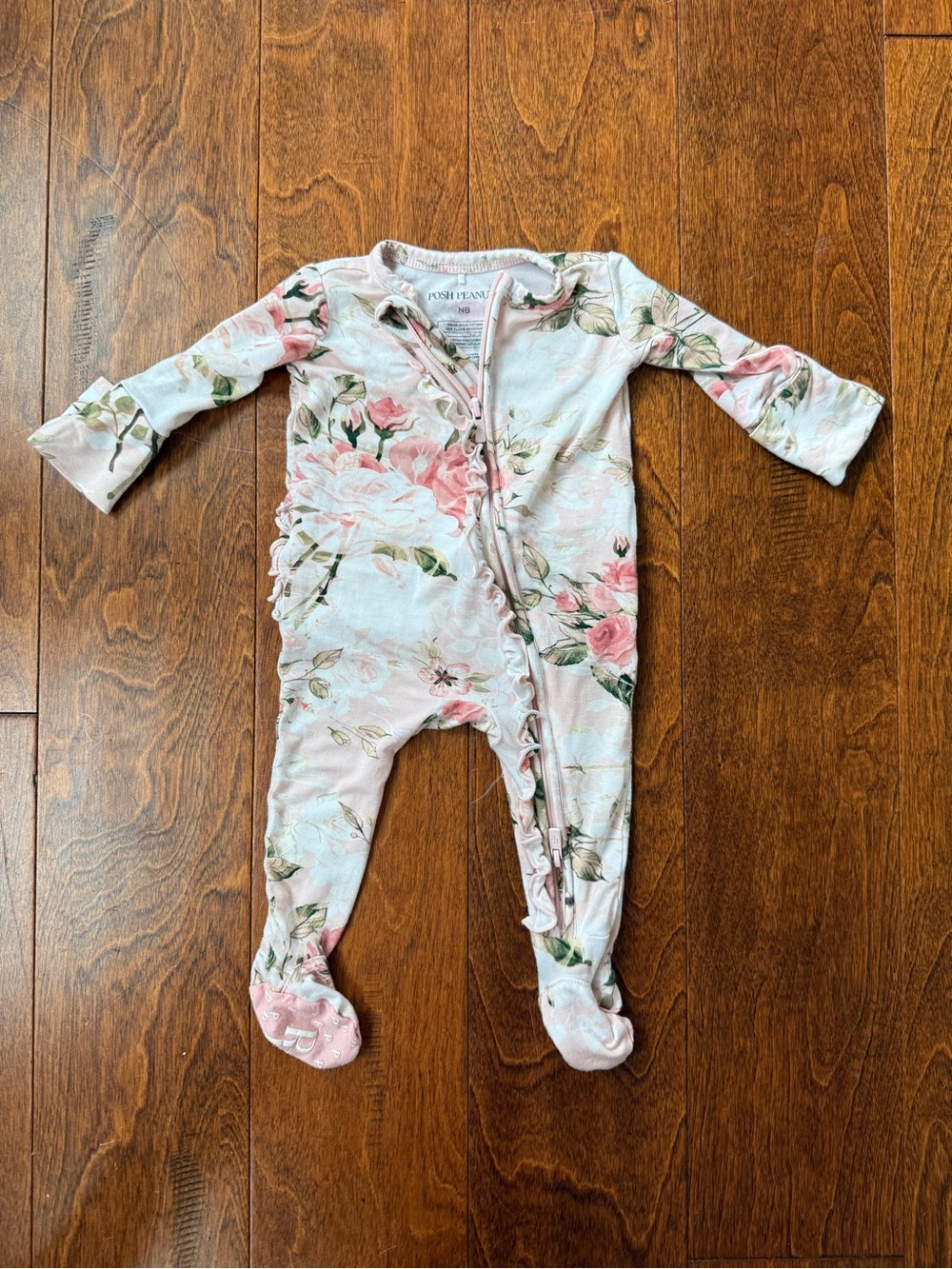 Posh Peanut NEwborn Pink Floral Ruffle Zip Footed One-Piece